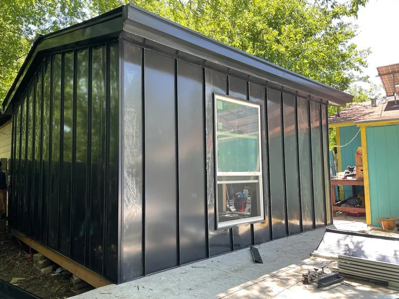 Black standing seam metal wall panels for Roof Inspection in Southside